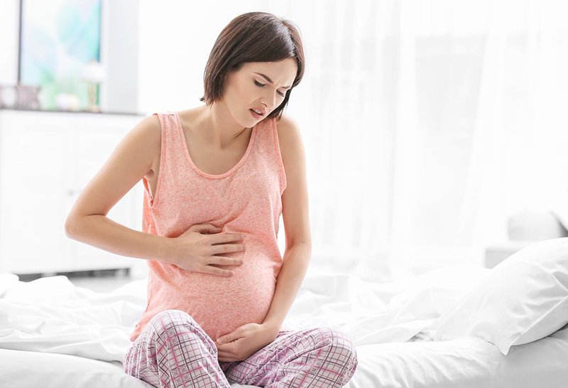 What do sharp pains indicate during pregnancy?